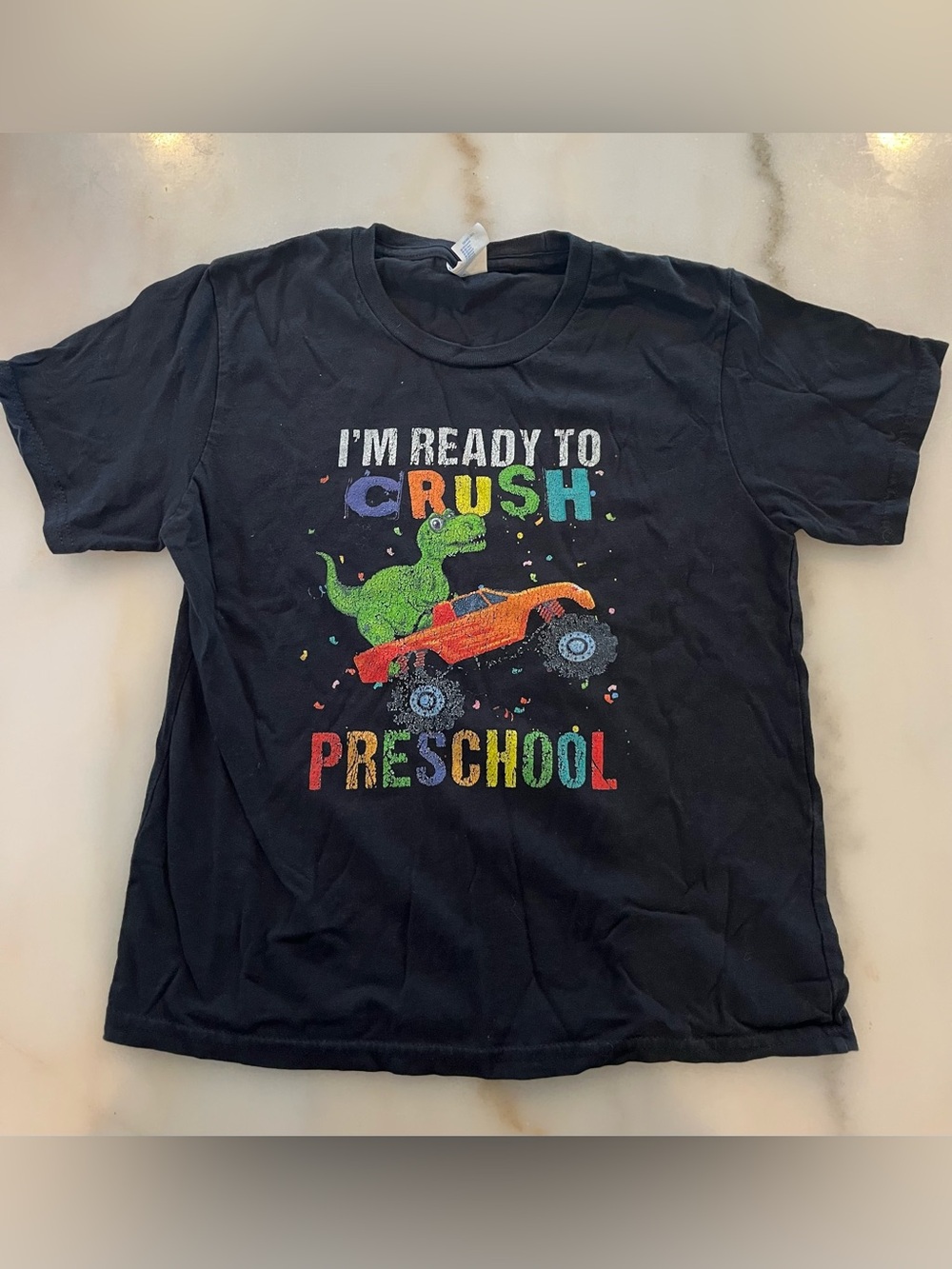 Black Toddler Tee with Colorful Dino & Monster Truck Graphic